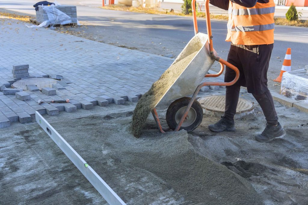 pouring-sand-from-wheelbarrow